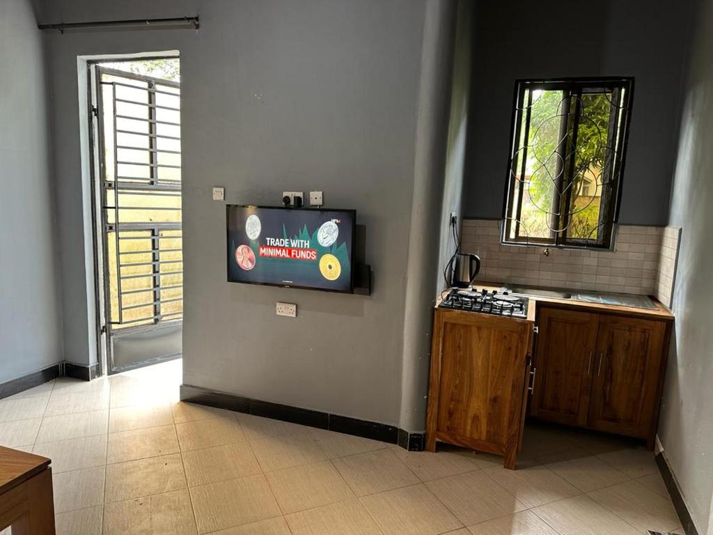 Kitchen access and facilities at Maro Homestay